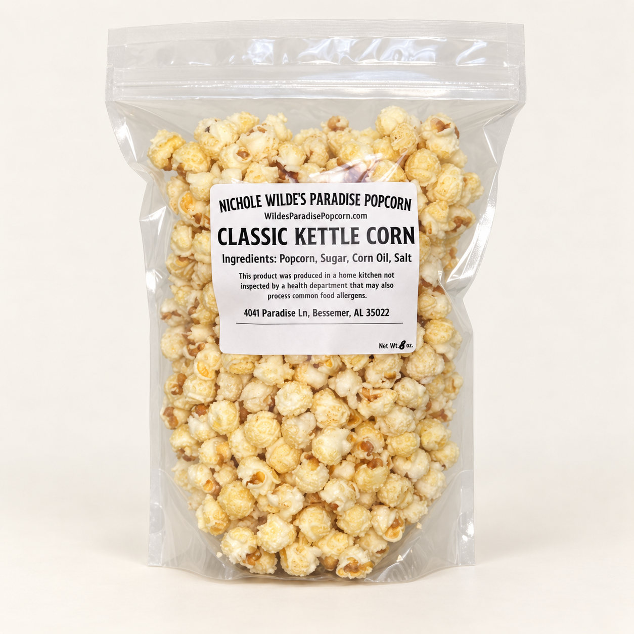 Clear 8-ounce bag of Paradise Popcorn Classic Kettle Corn